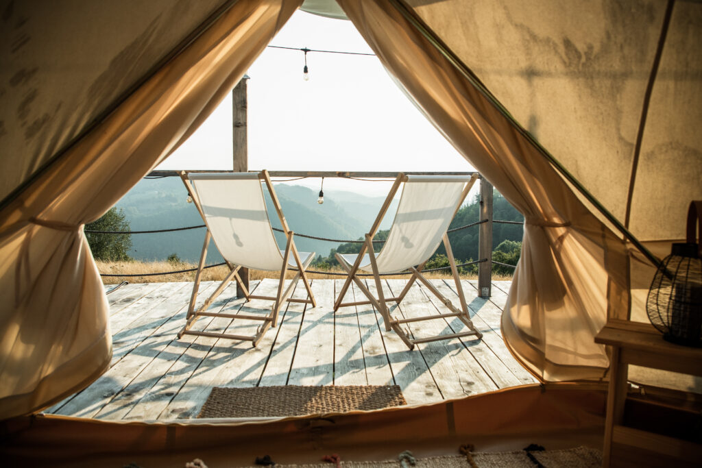 Glamping tent with a view. How to increase your revenue as a glamping business.